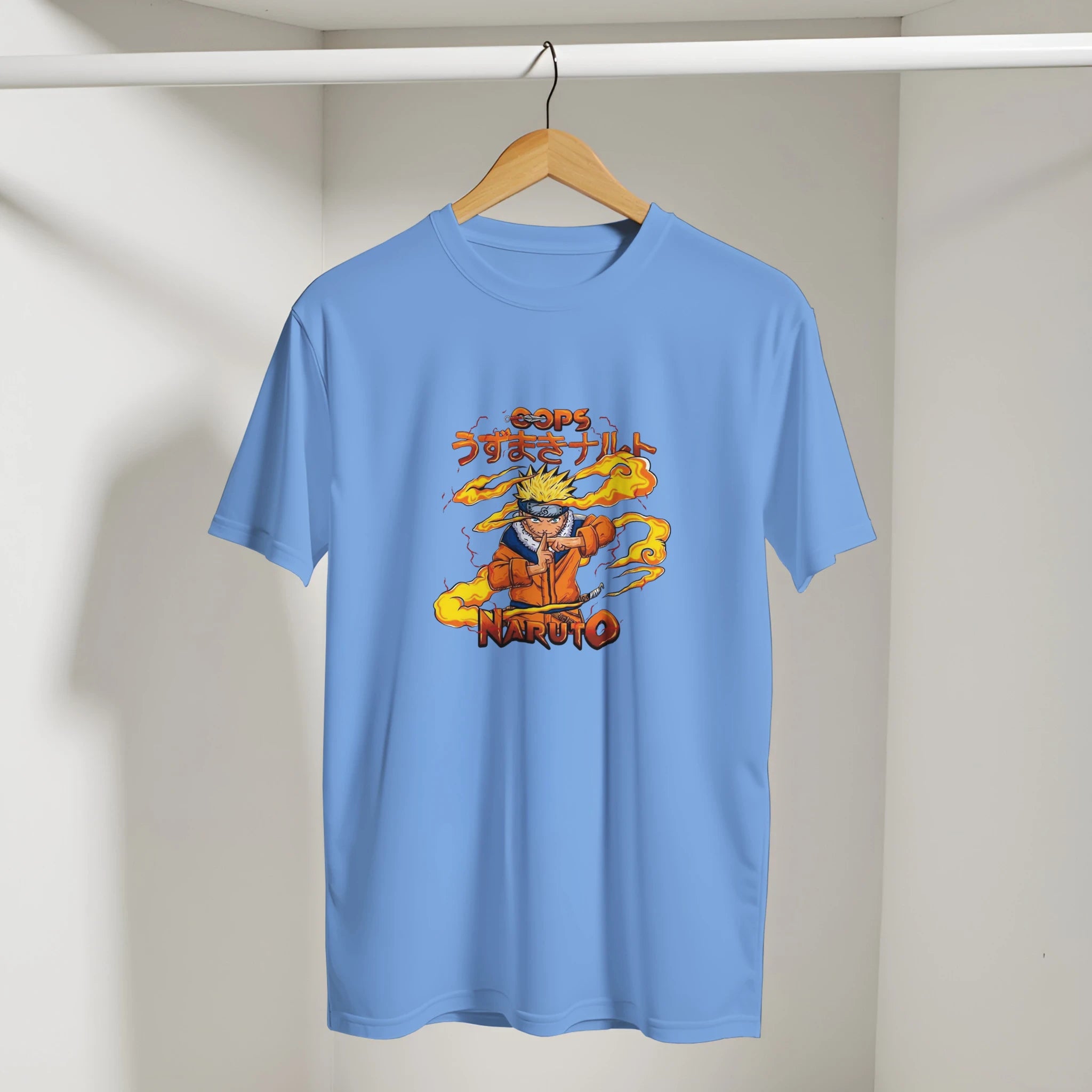 Blue t-shirt with Naruto graphic on a hanger against a plain background